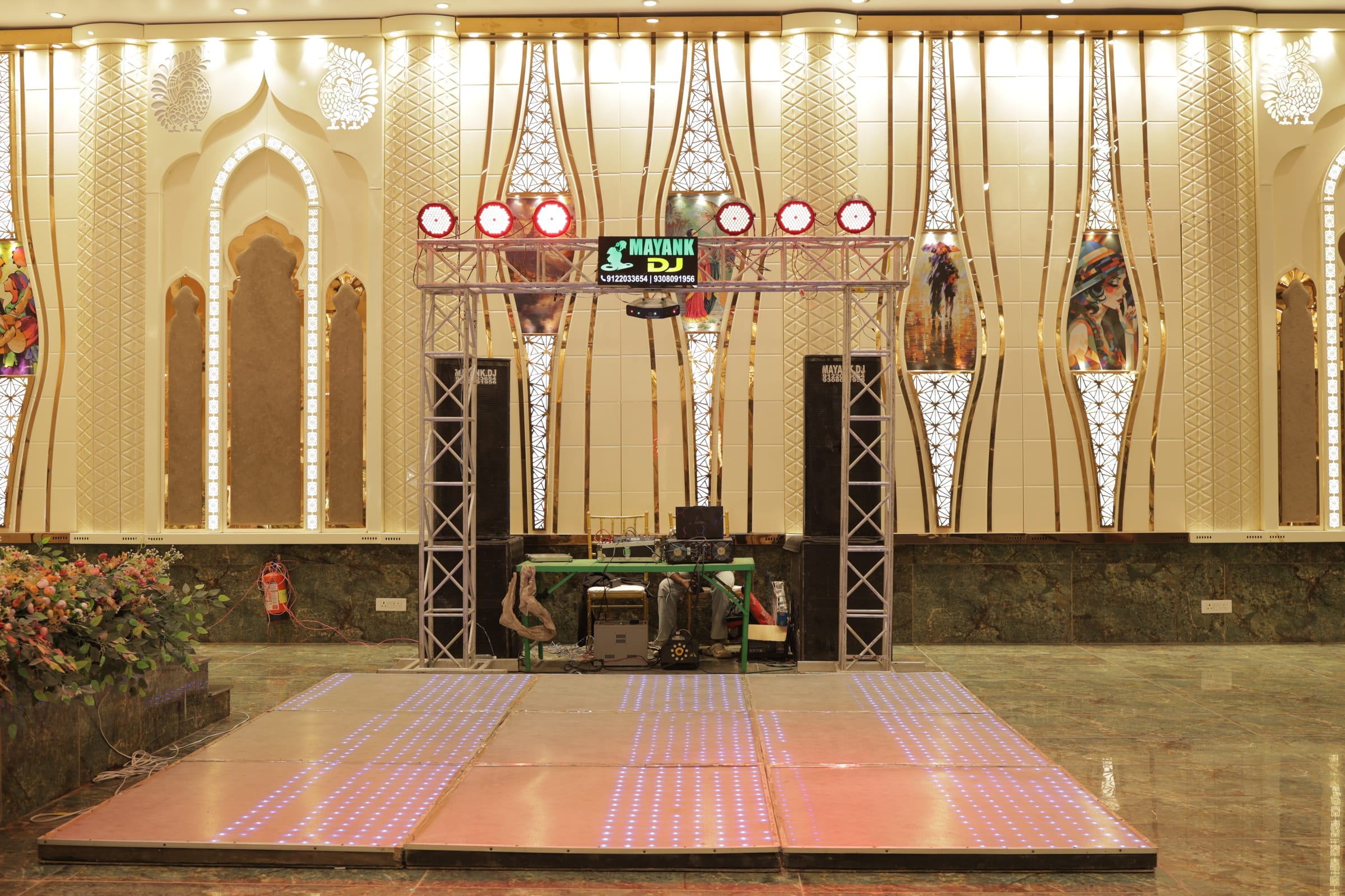 A lit stage and empty dance floor before the guests arrive